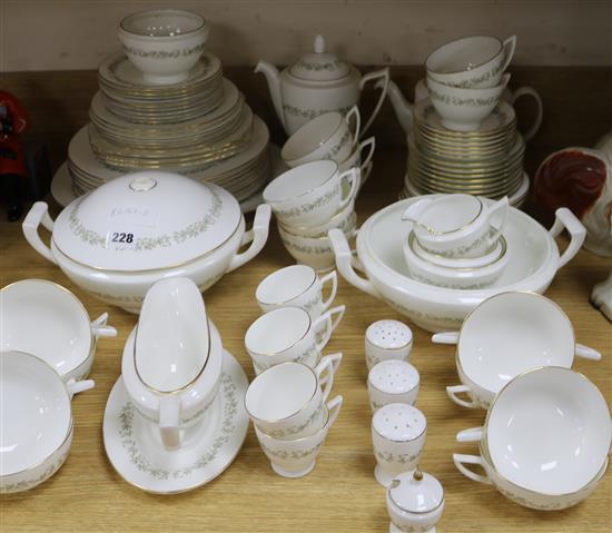 A Minton April pattern gilt part dinner service